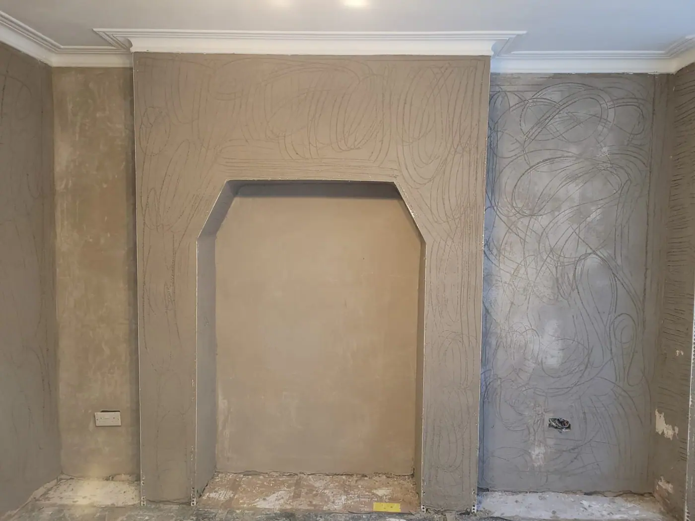 A Brook Green basement wall floated and set