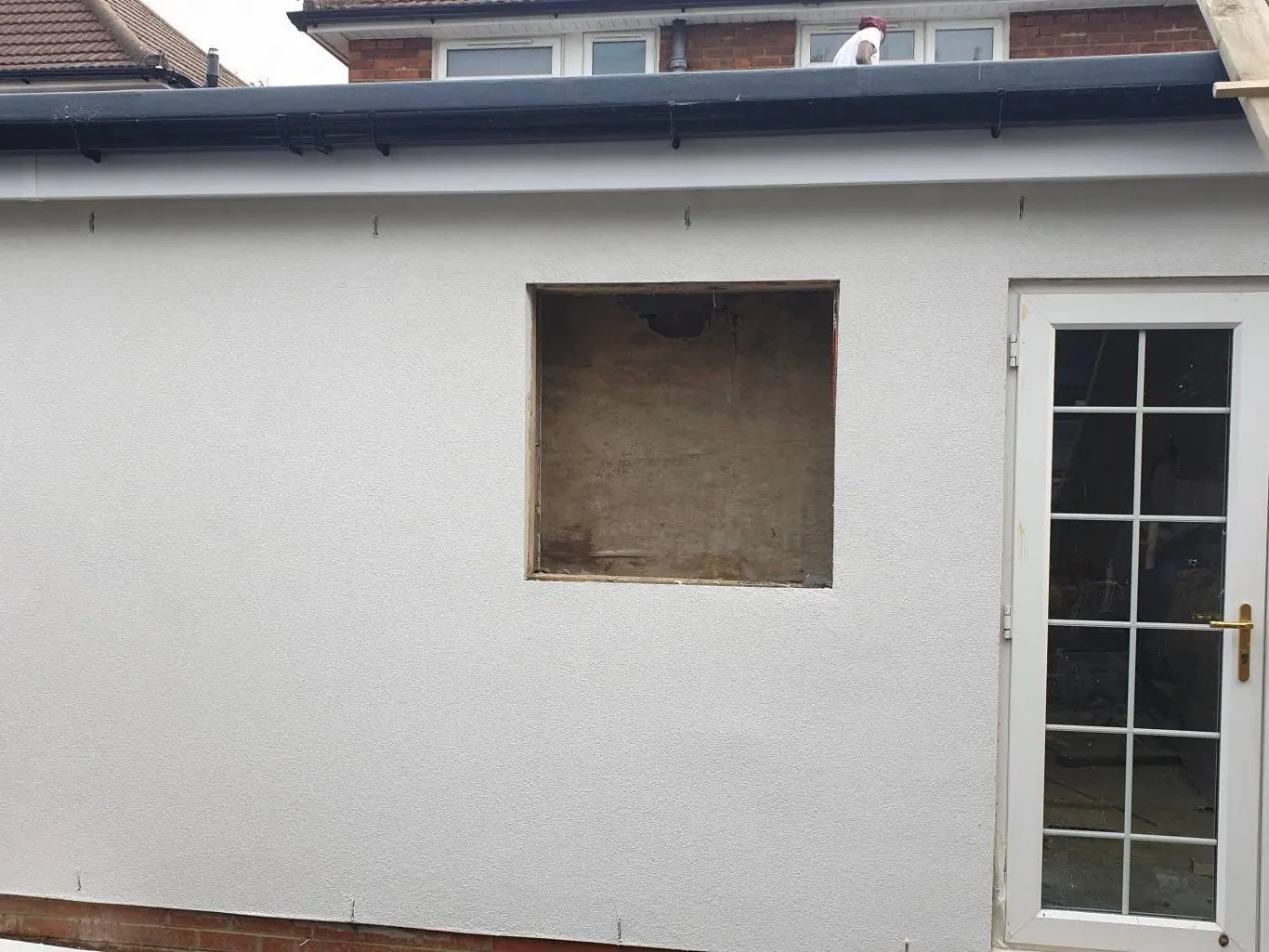 A building in Barnet finished in white silicone render